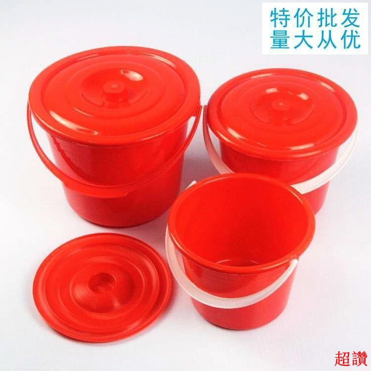 small red plastic buckets