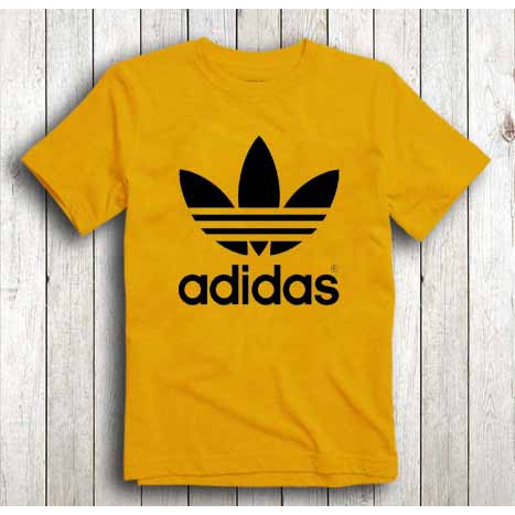 white and yellow adidas shirt