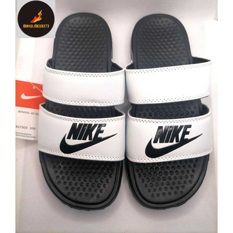 nike slides with straps on the back
