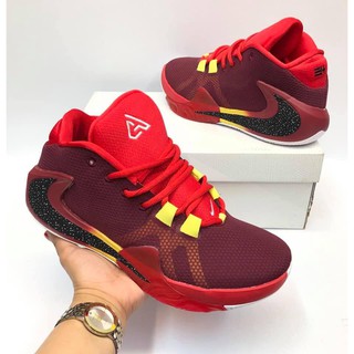 maroon athletic shoes