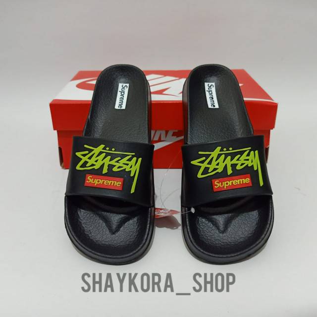 supreme flip flops red