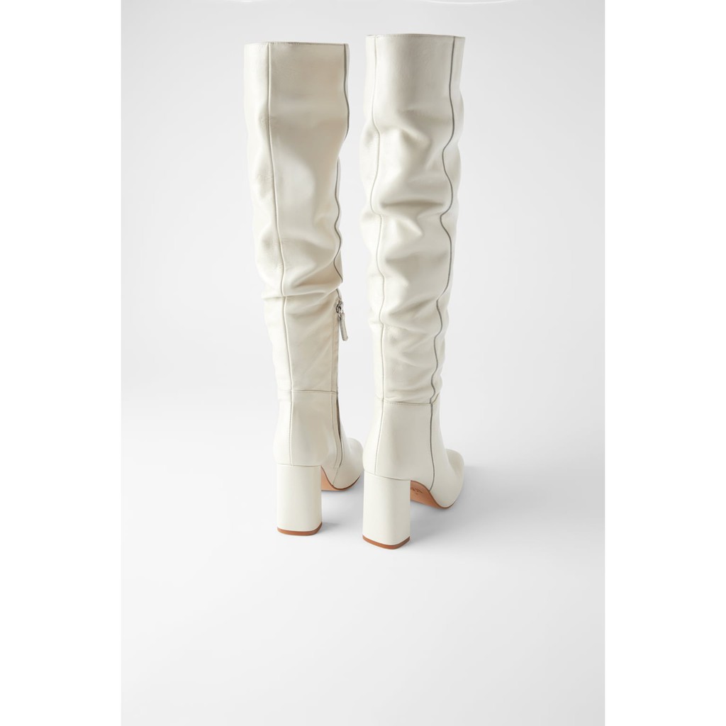 tall white boots heels