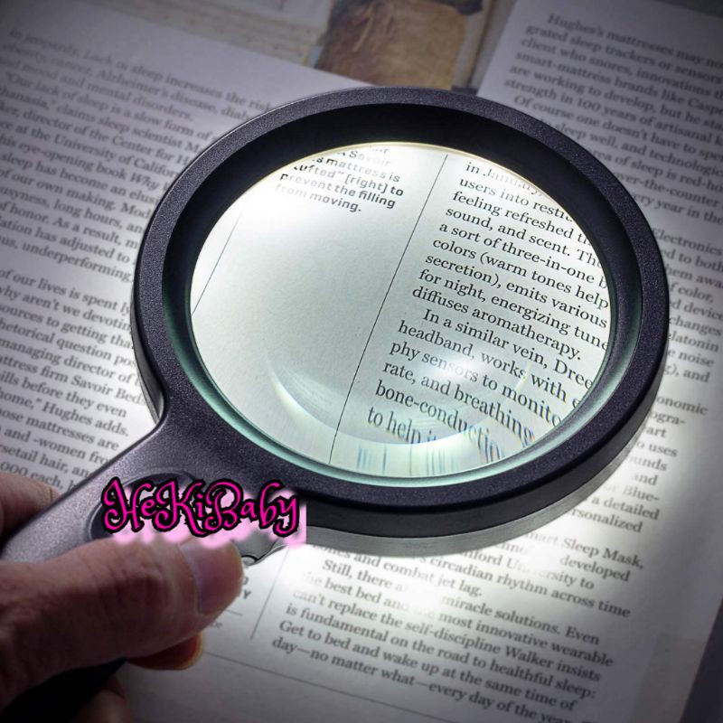 book magnifying glass with light