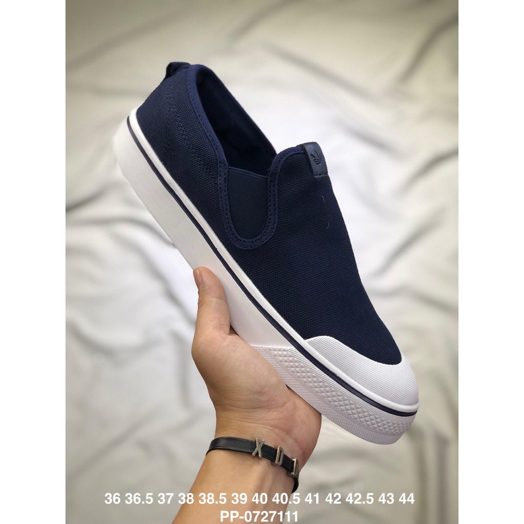 adidas blue canvas trainers