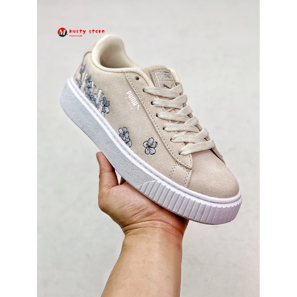 puma suede platforms in white with embroidery