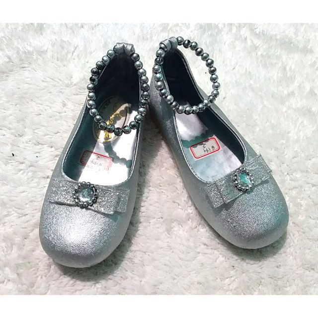 silver baby shoes