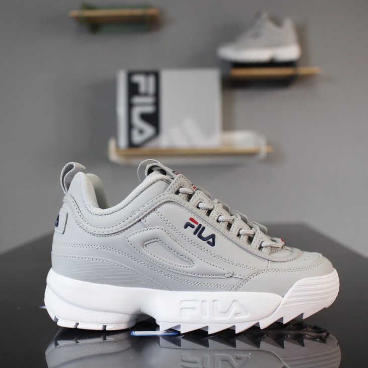 grey and white fila shoes