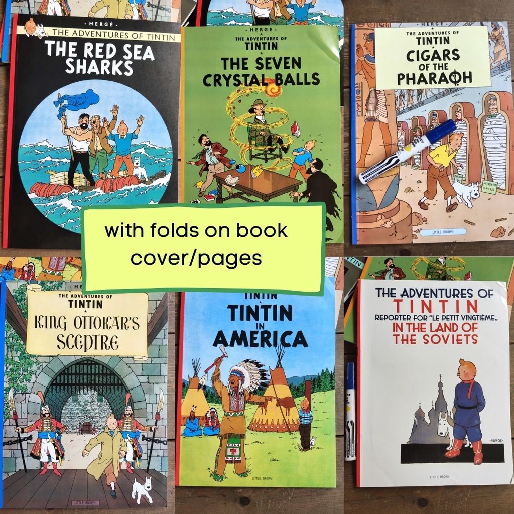 Featured image of Adventures of Tintin (SINGLES) with dents and folds on book cover and pages