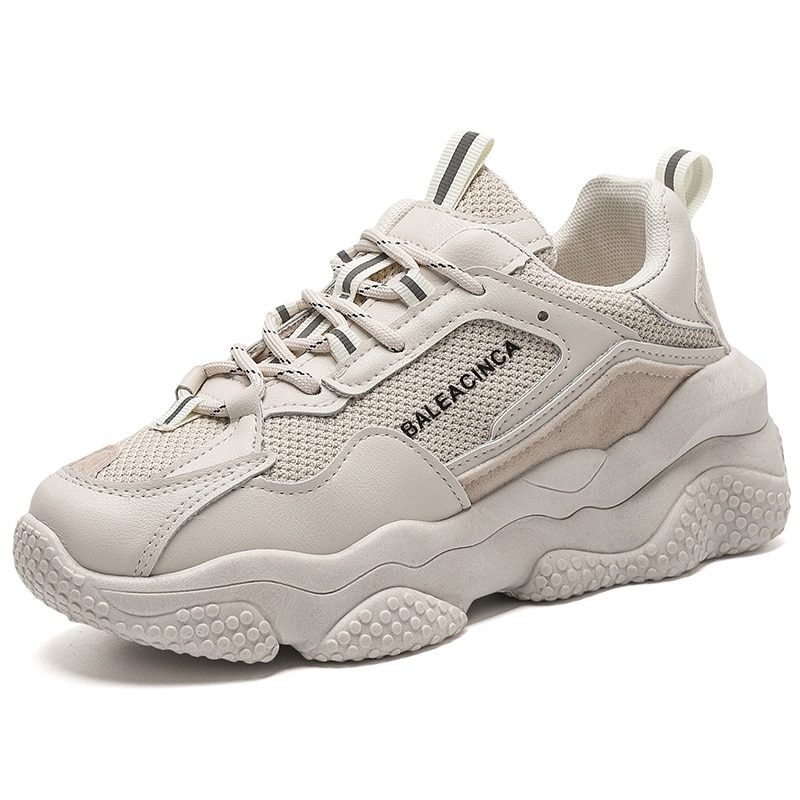 black and beige sneakers