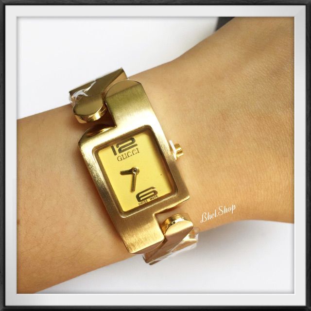 gucci zig zag gold watch price