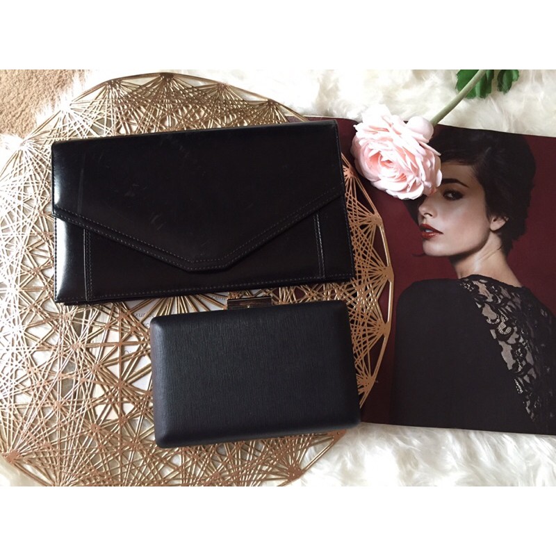 black and beige clutch bag