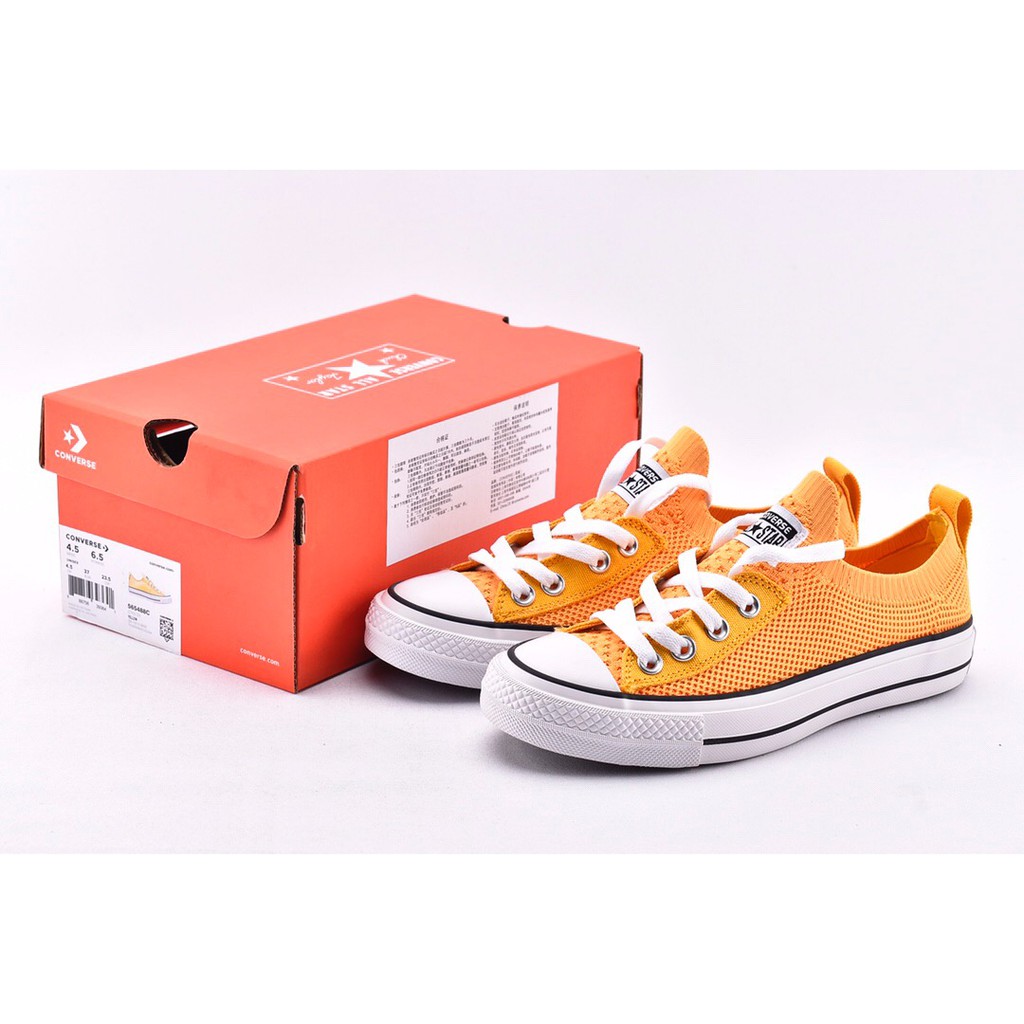 orange chuck taylors mens