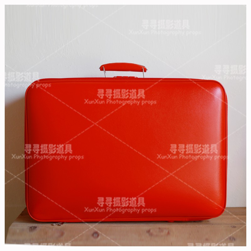 red vintage suitcase