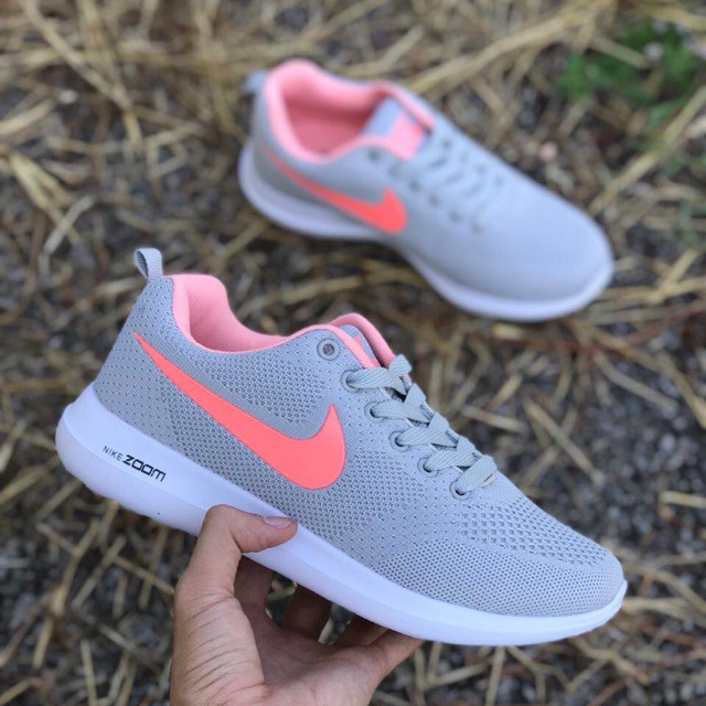 grey and peach nike shoes