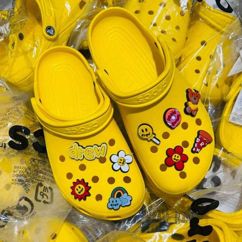 light blue and yellow crocs