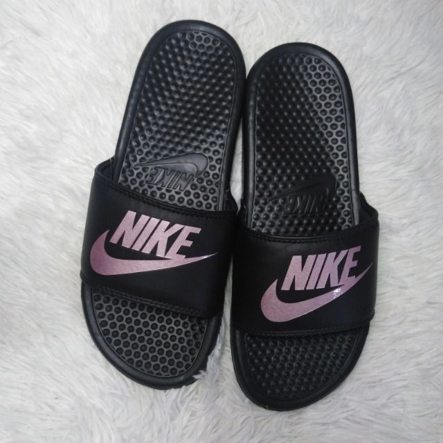 rose gold and black nike slides