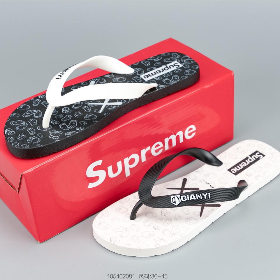 supreme flip flops red