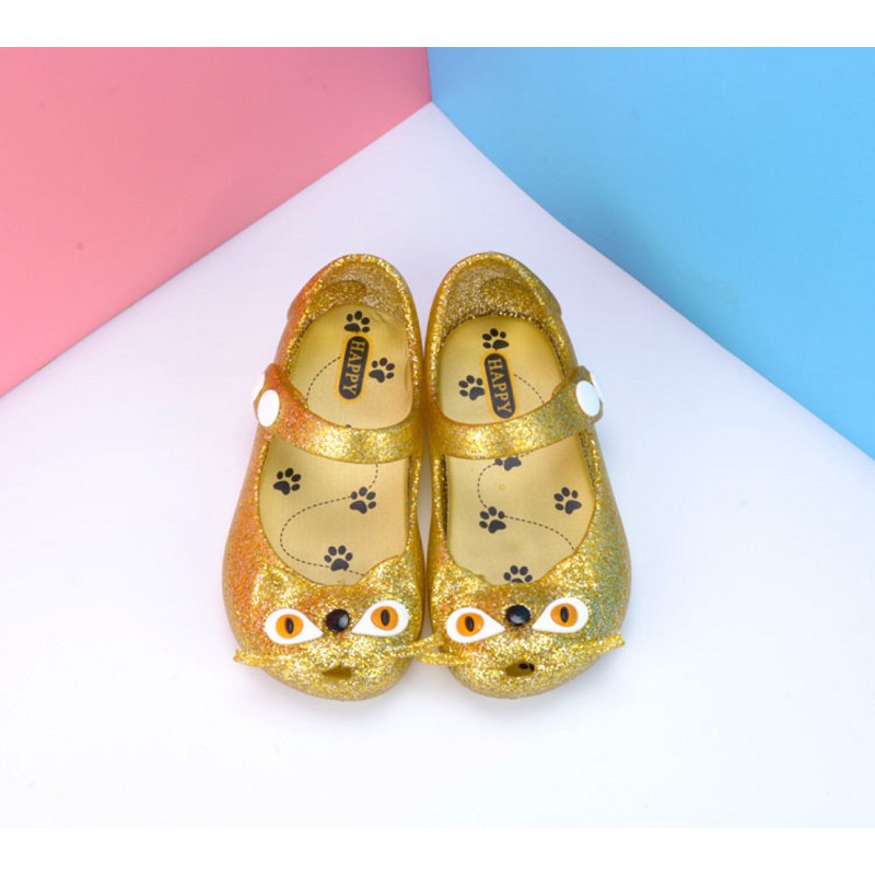 gold jelly shoes