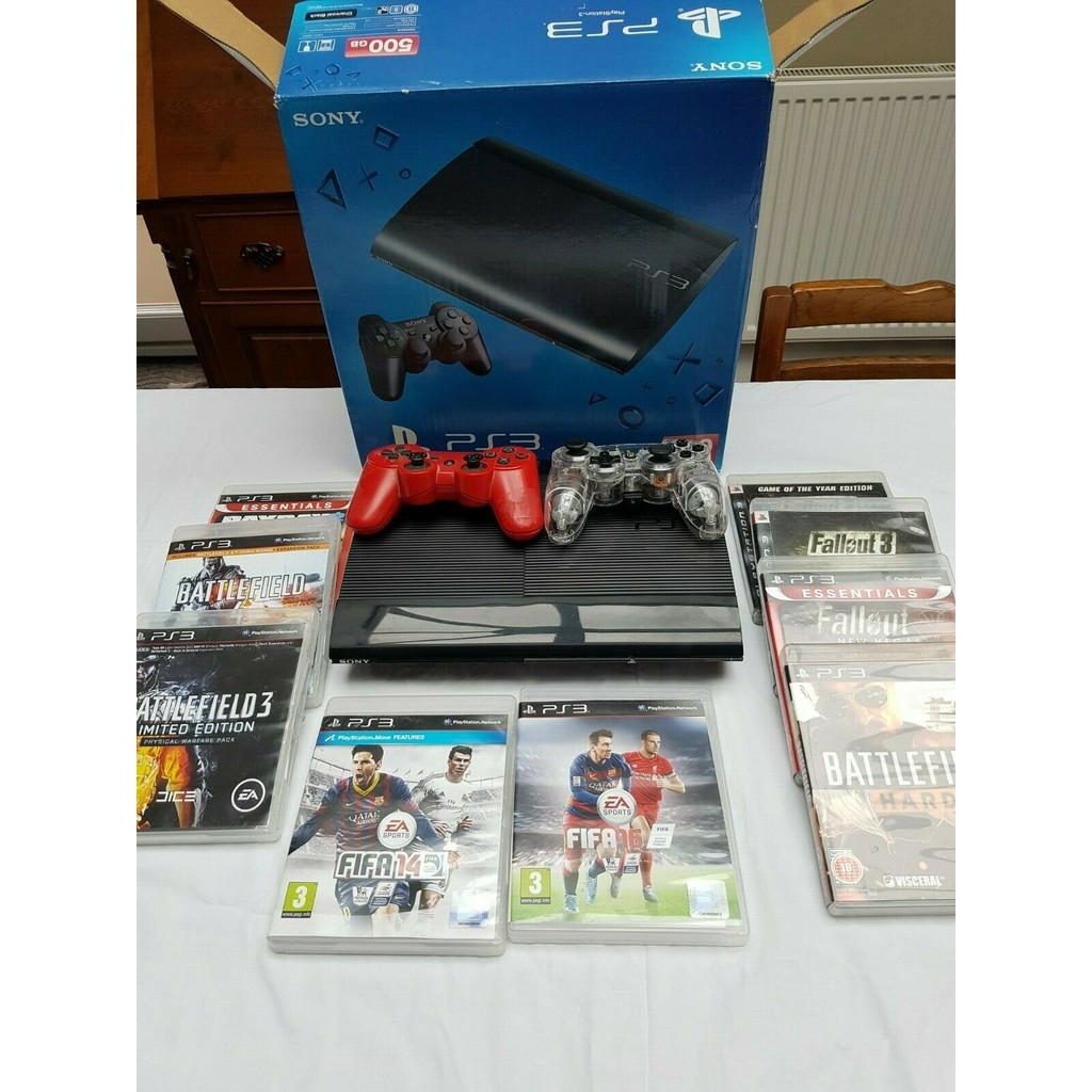 ps3 console with 2 controllers