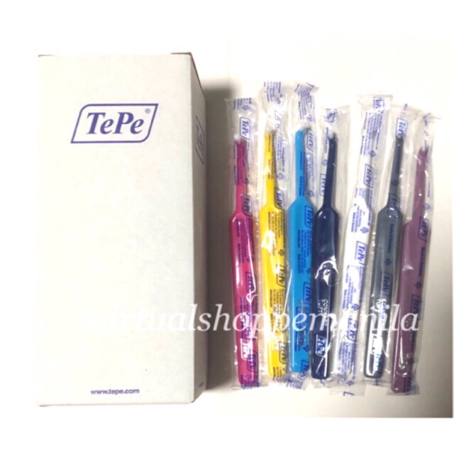 tuft toothbrush