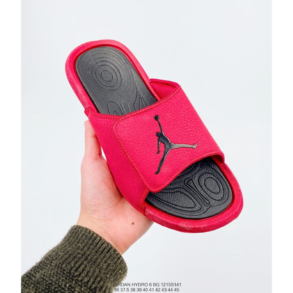 red and black nike slippers