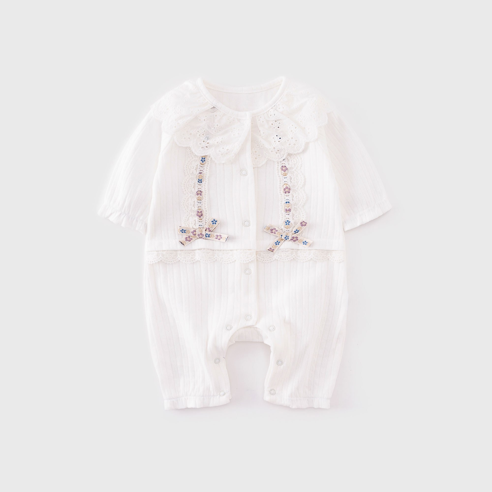 white newborn romper