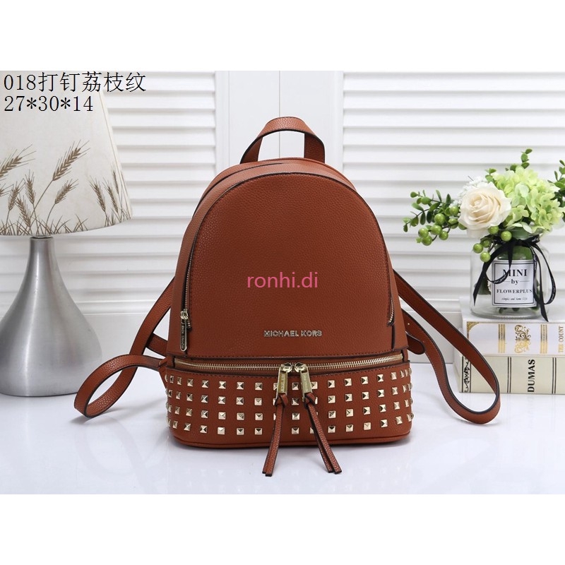 mk studded backpack