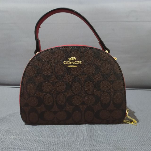 round coach purse