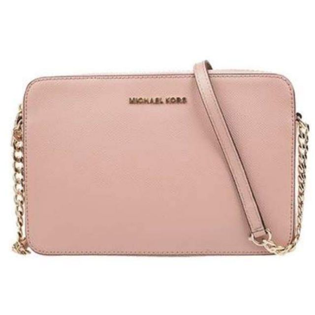 mk pink sling bag