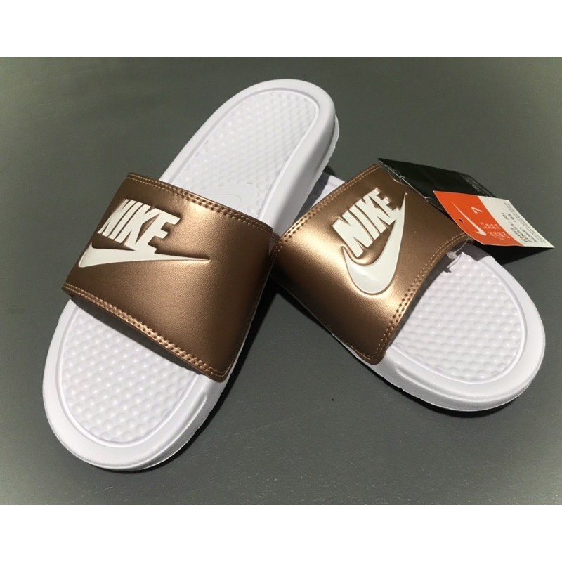 bronze nike slides