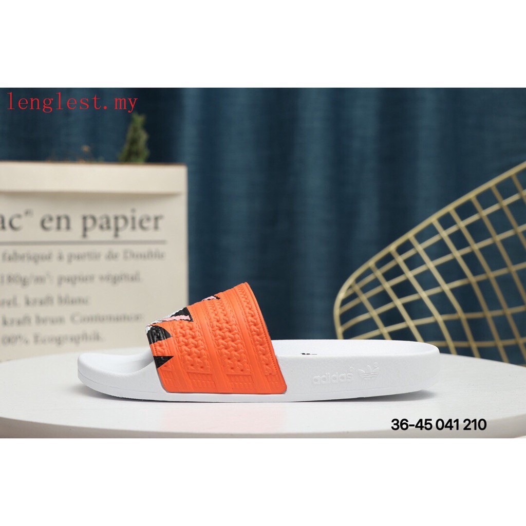 adidas orange flip flops