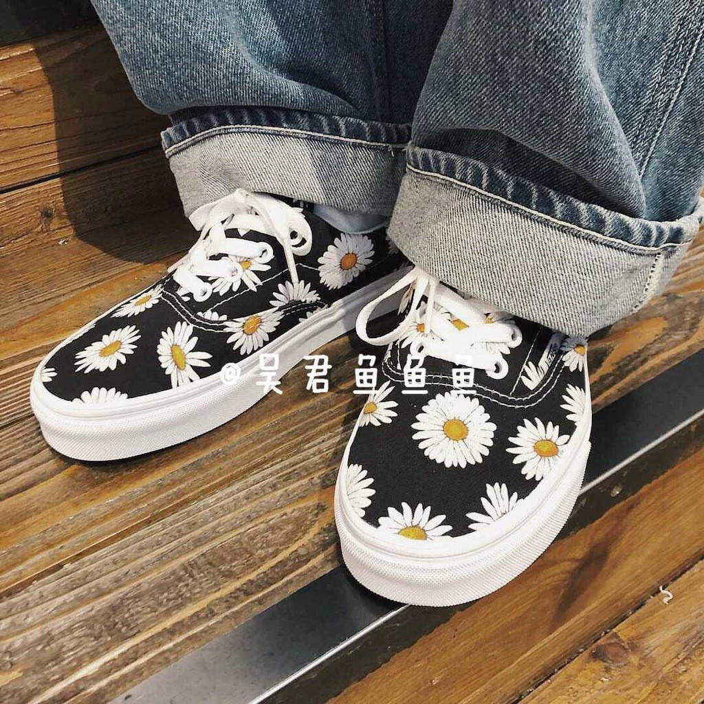 vans era big daisies