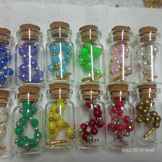 With Layout Mini rosary in mini bottle for souvenir and give aways