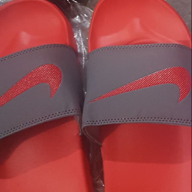 red nike slides for men