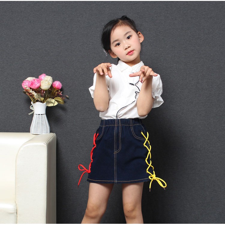 girls in short denim skirts