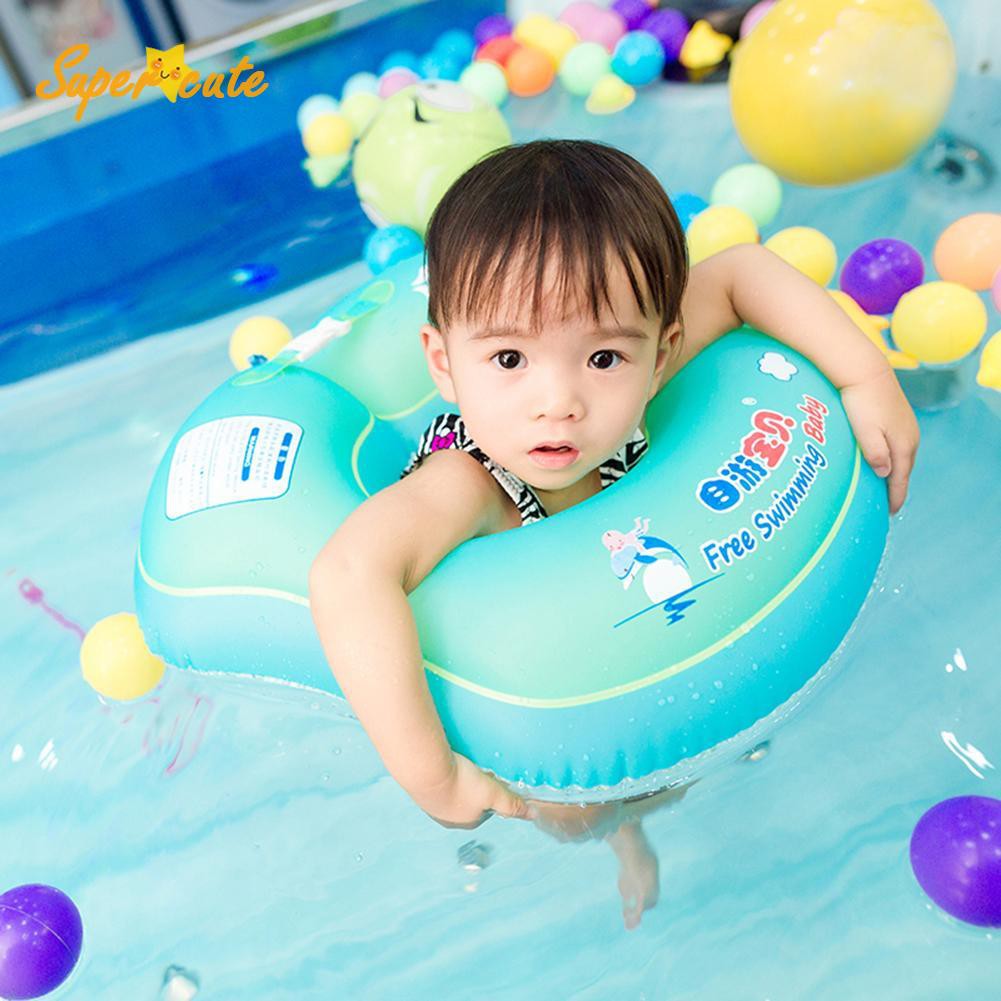 baby floating in pool