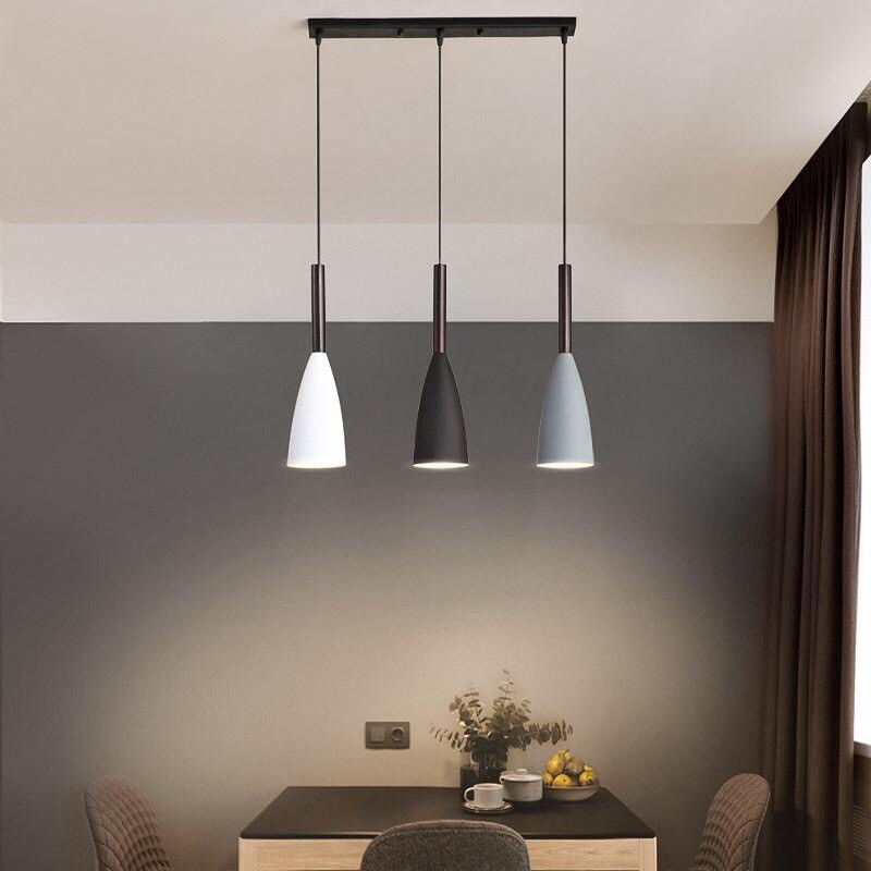 hanging light fixture over dining room table