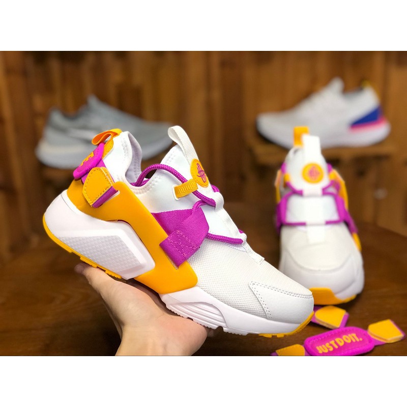 nike air huarache city low pink