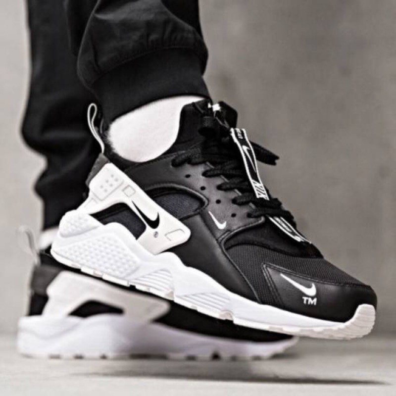 black and white huaraches with zipper