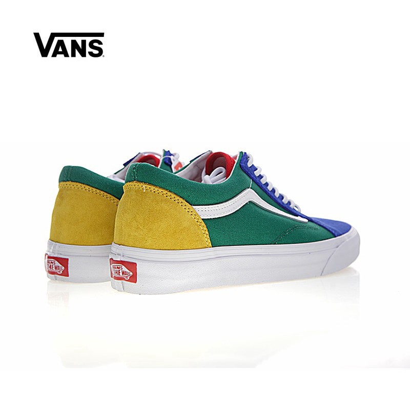 blue and yellow old skool vans