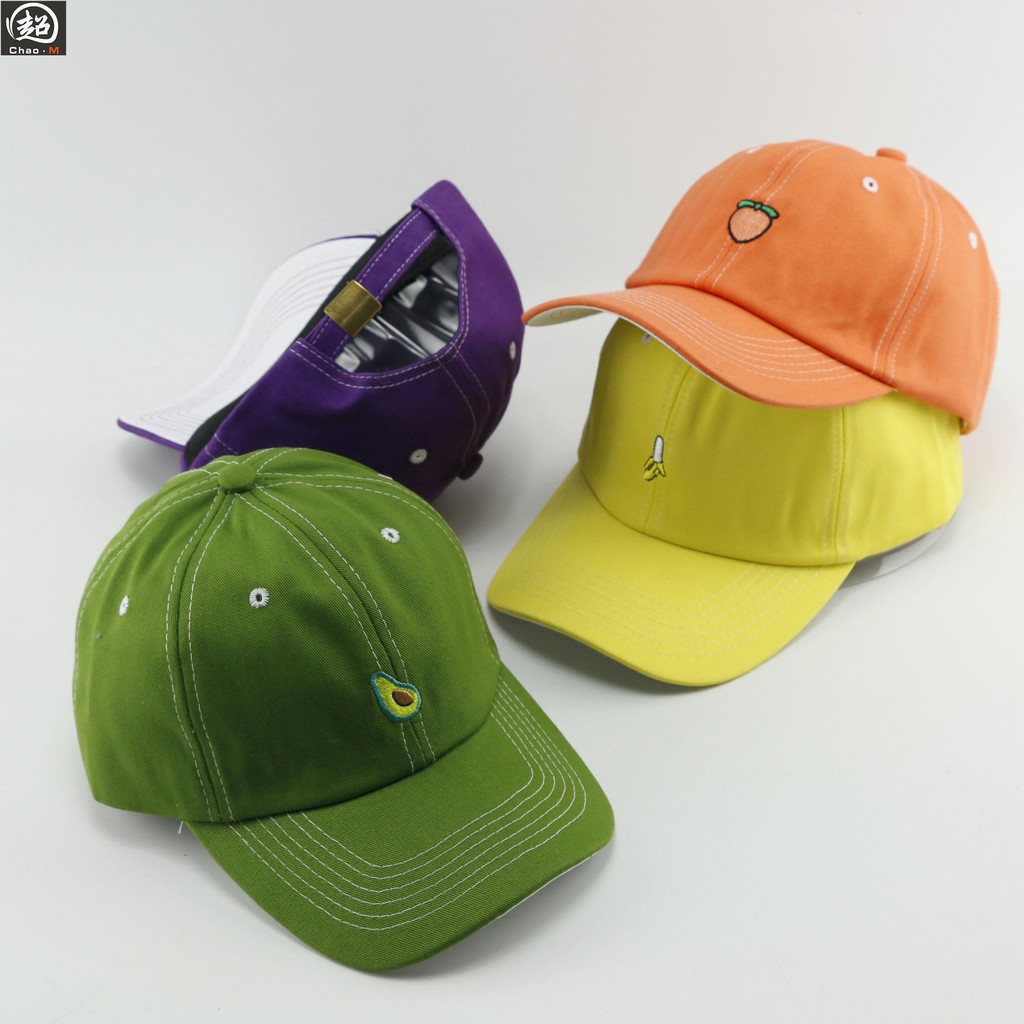 green baseball cap