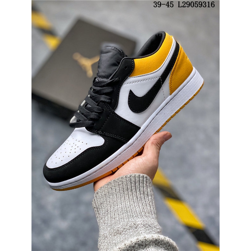 yellow black and white jordan 1