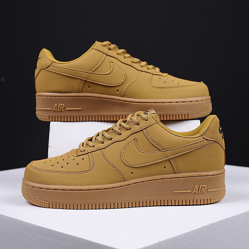nike air force with yellow tick