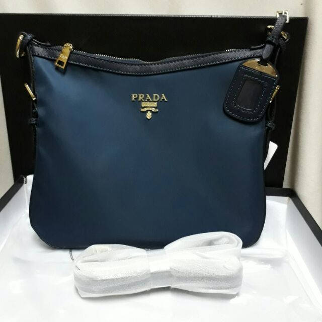 prada blue sling bag