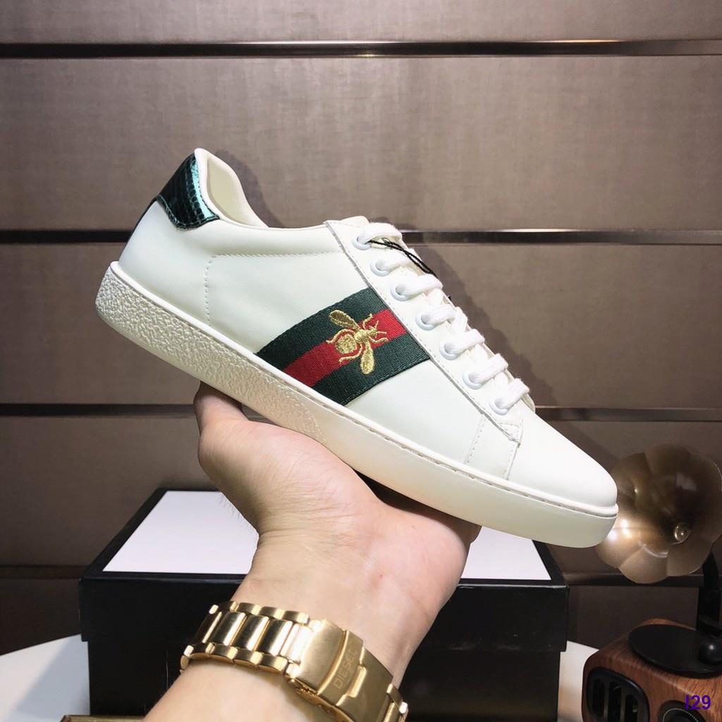 sneakers with bee logo