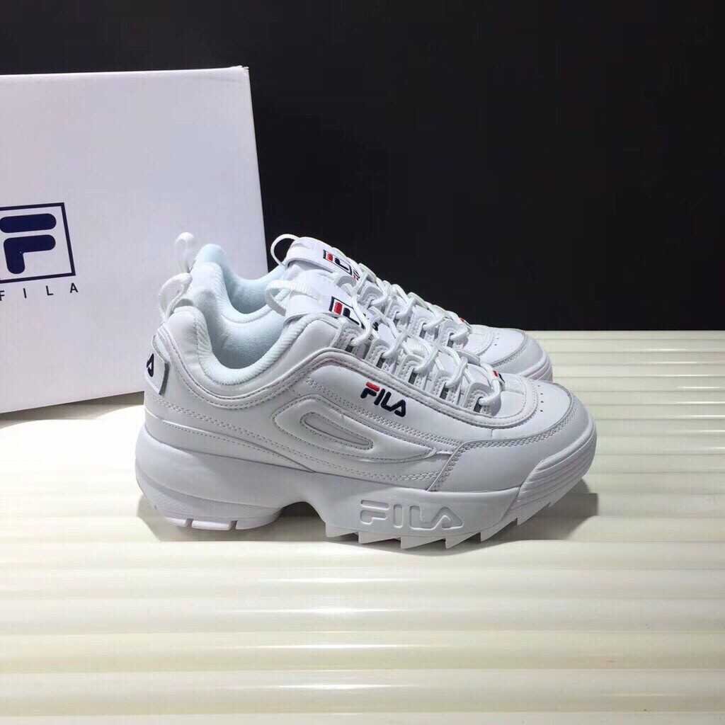 grey and white fila shoes