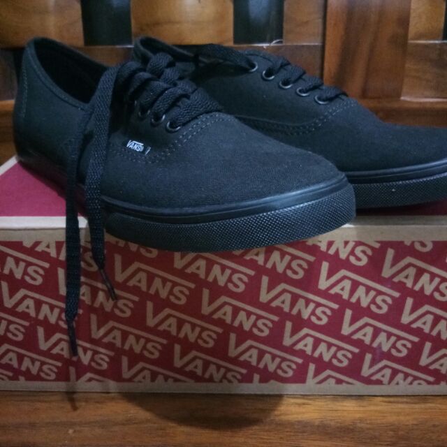 all black low top vans
