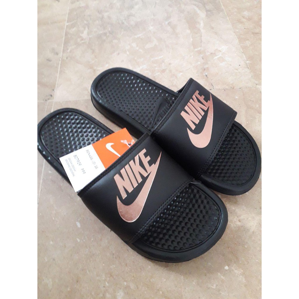 bronze nike slides