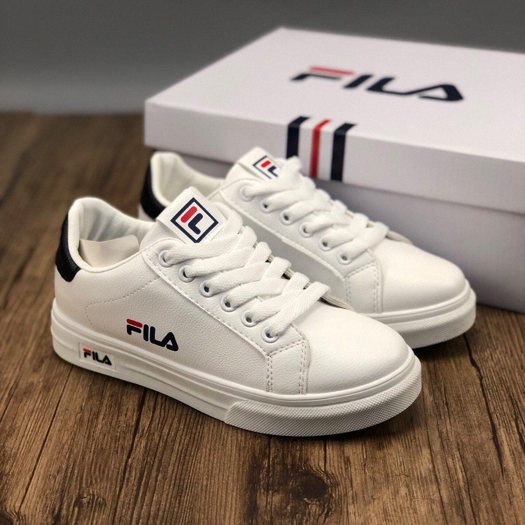 white leather fila shoes