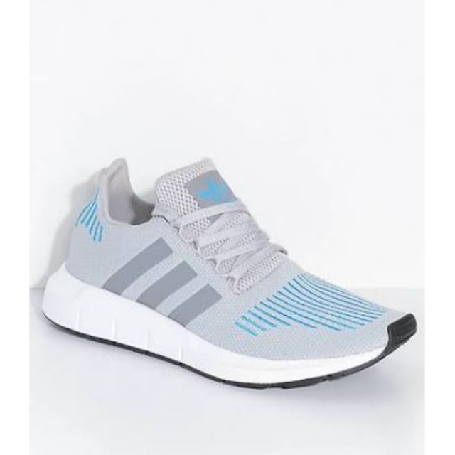 grey and blue adidas shoes